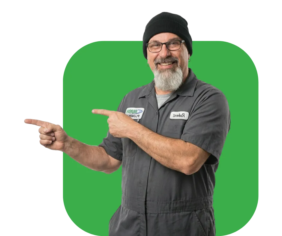 Robert Craul from Rush Plumbing pointing to the right, pointing out that we understand the Seattle area's plumbing problems.